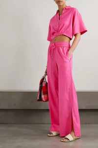 FRAME Cropped Twist Front Top in flamingo pink - women's blouse - detail view