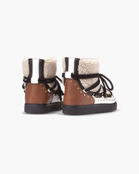 Inuikii Women's Curly Rock Winter Boots in cream - women's shoe - detail view