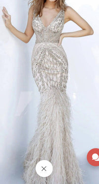 Jovani - beaded and feather gown