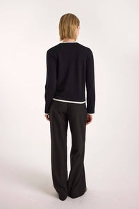 Brodie Cashmere Double Contrast Crew Neck Sweater in black ivory - women's sweater - detail view