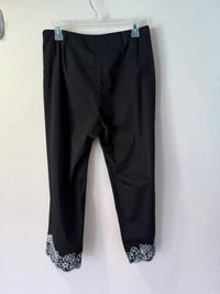 Ann Trinity Women's Embroidered Hem Side Zip Crop Pant in black with white trim - women's pants - detail view
