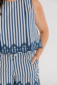 Skies Are Blue - Sleeveless Striped Top With Embroidery Hem