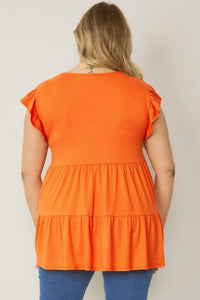 entro Tiered Ruffle Babydoll Top in orange - women's t-shirt - detail view