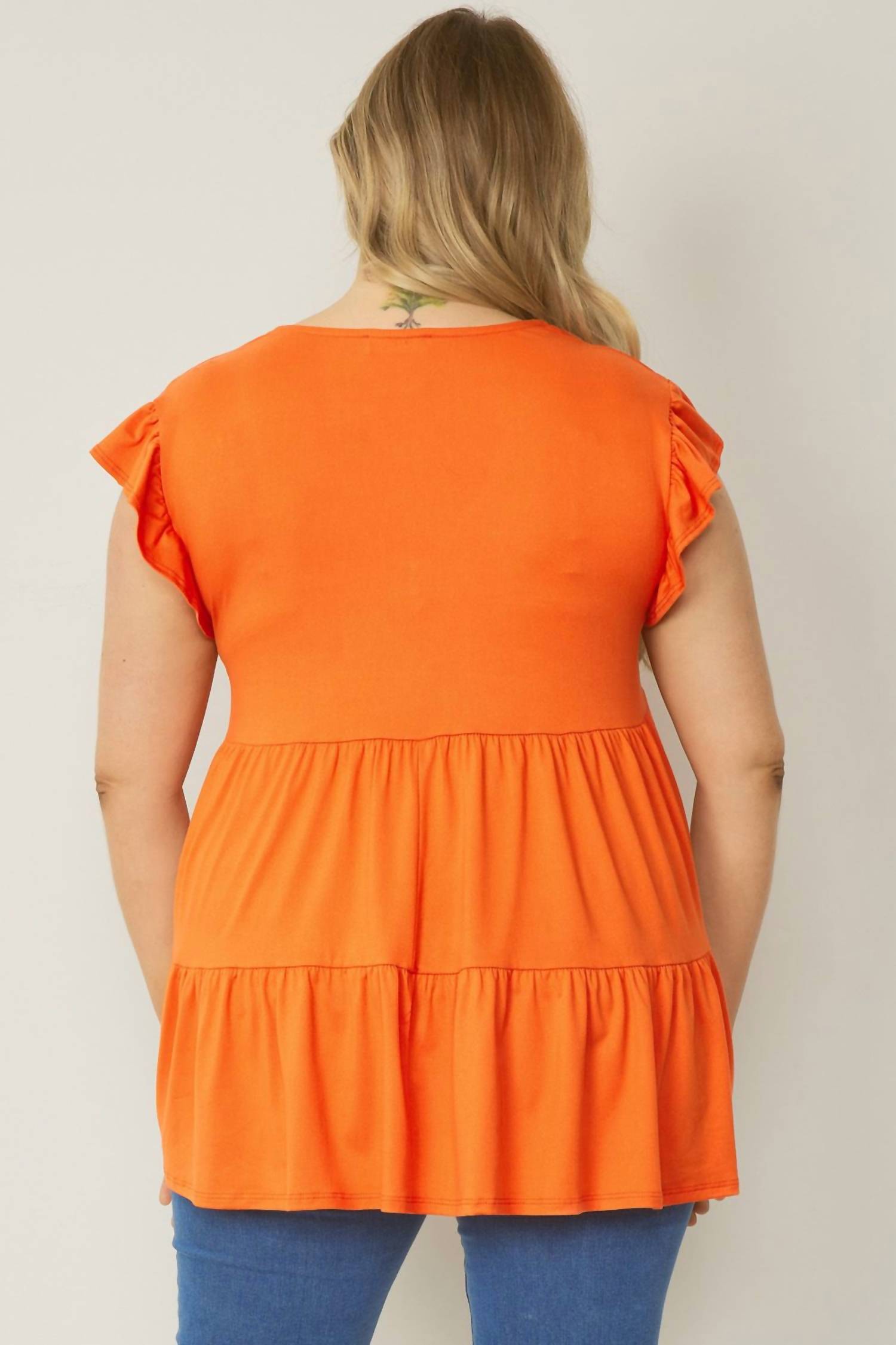 entro Tiered Ruffle Babydoll Top in orange - women's t-shirt - detail view