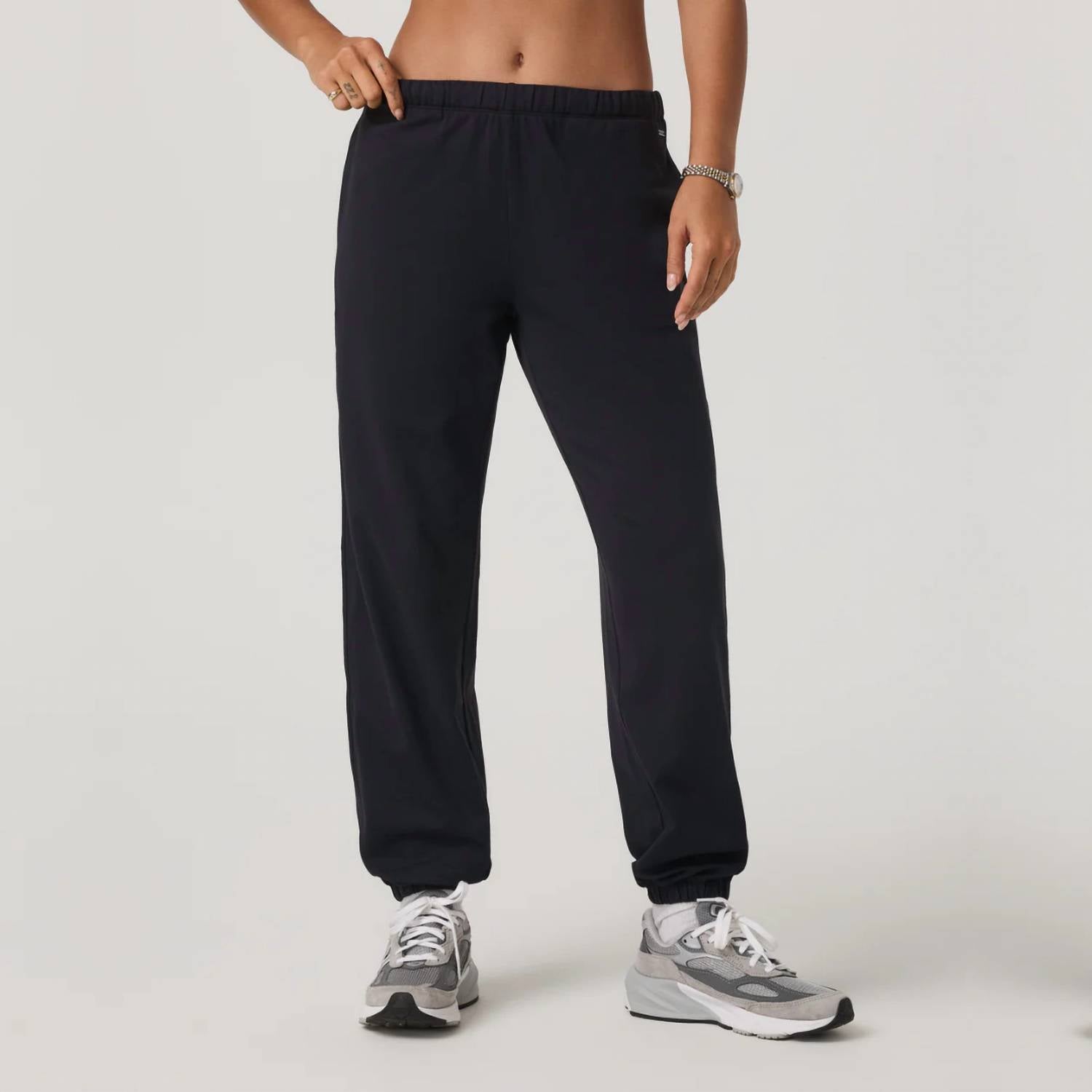 Vuori Halo Modern Sweatpant in solid black - women's pants