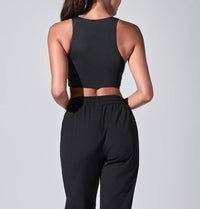 HEROINE SPORT Twisted Symmetric Neck Top in black - women's tank top - alternate view