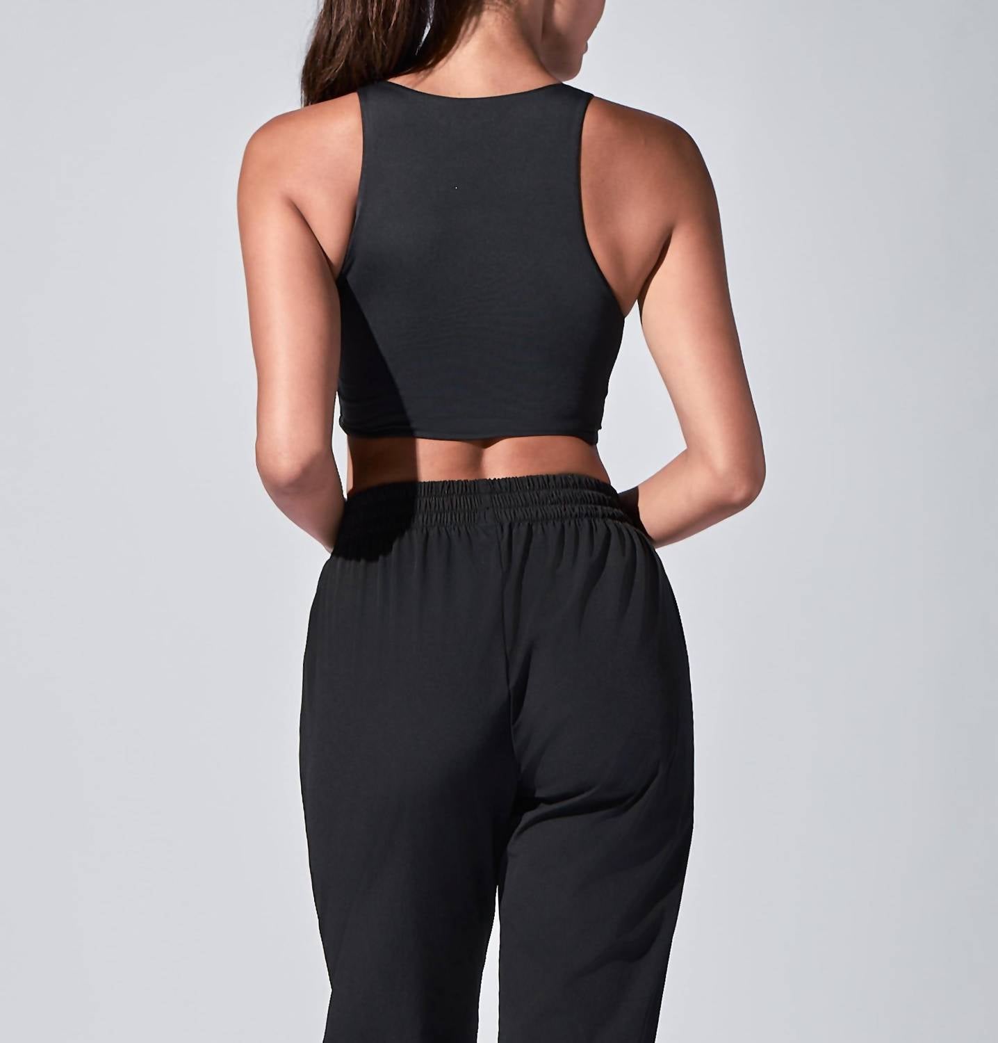 HEROINE SPORT Twisted Symmetric Neck Top in black - women's tank top - alternate view