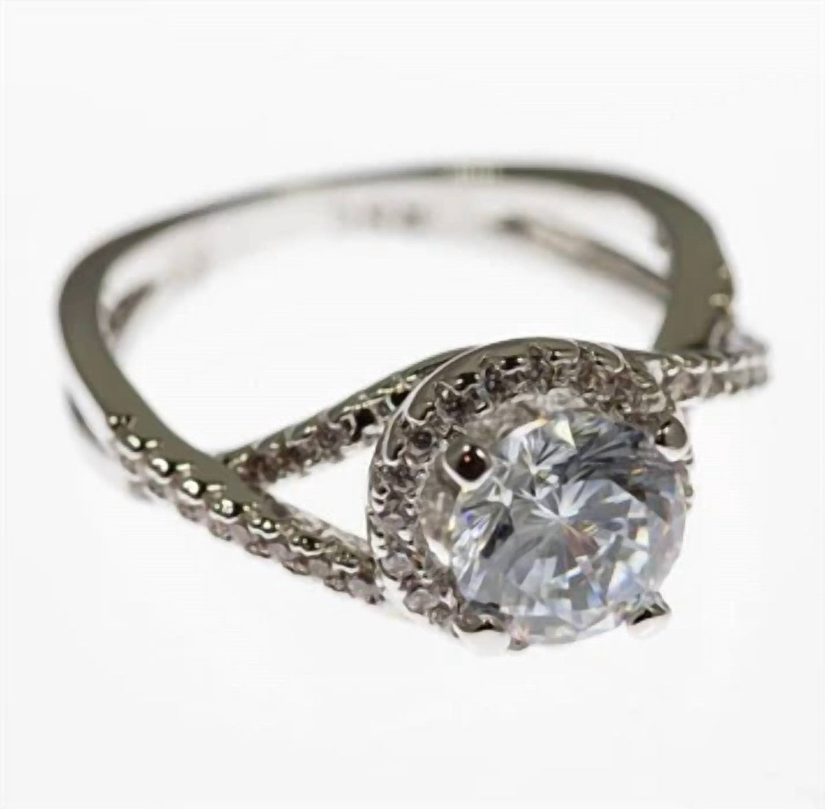 Faire - TWISTED SOLITAIRE CZ RHODIUM PLATED RING