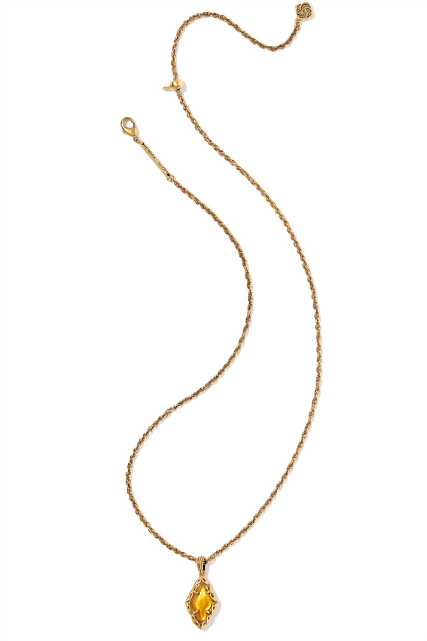 Kendra Scott Women's Adeline Short Pendant Vintage Necklace in gold marbled amber illusion - women's jewelry - detail view