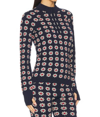 THE GREAT. Merino Quarter Zip Sweater in frosted daisy - women's sweater - detail view
