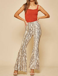 ANDREE BY UNIT Bell Bottom Pants in snake print - women's pants