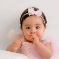 A Little Lacey Baby Bow Headband in pink - kids' accessory - detail view