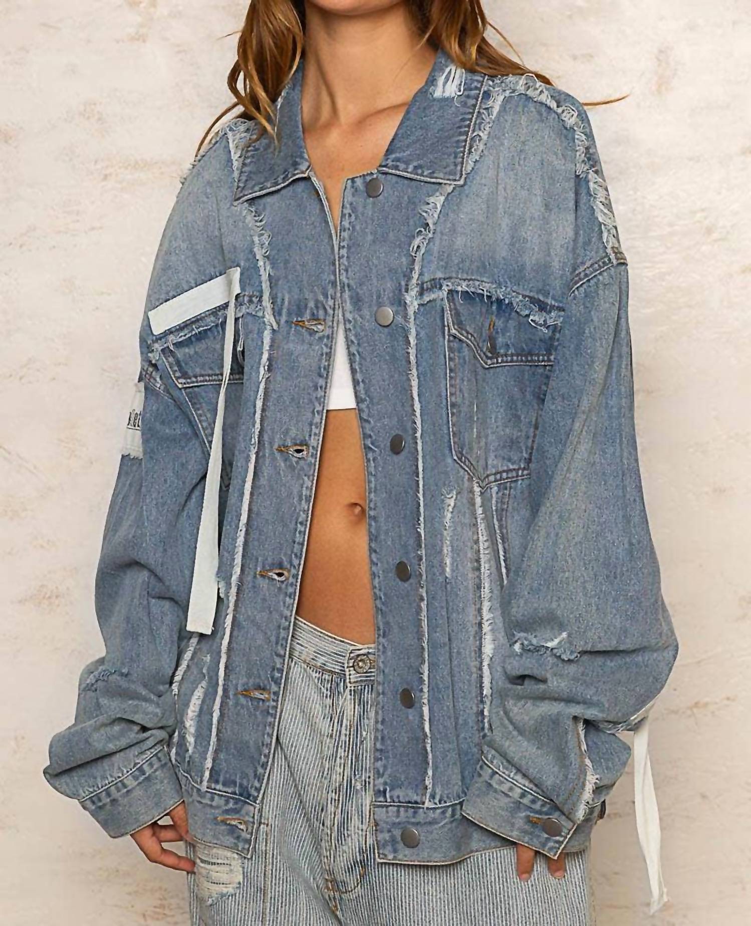 POL Remma Oversize Patch Detail Frayed Edge Jacket in light denim - women's jacket - detail view