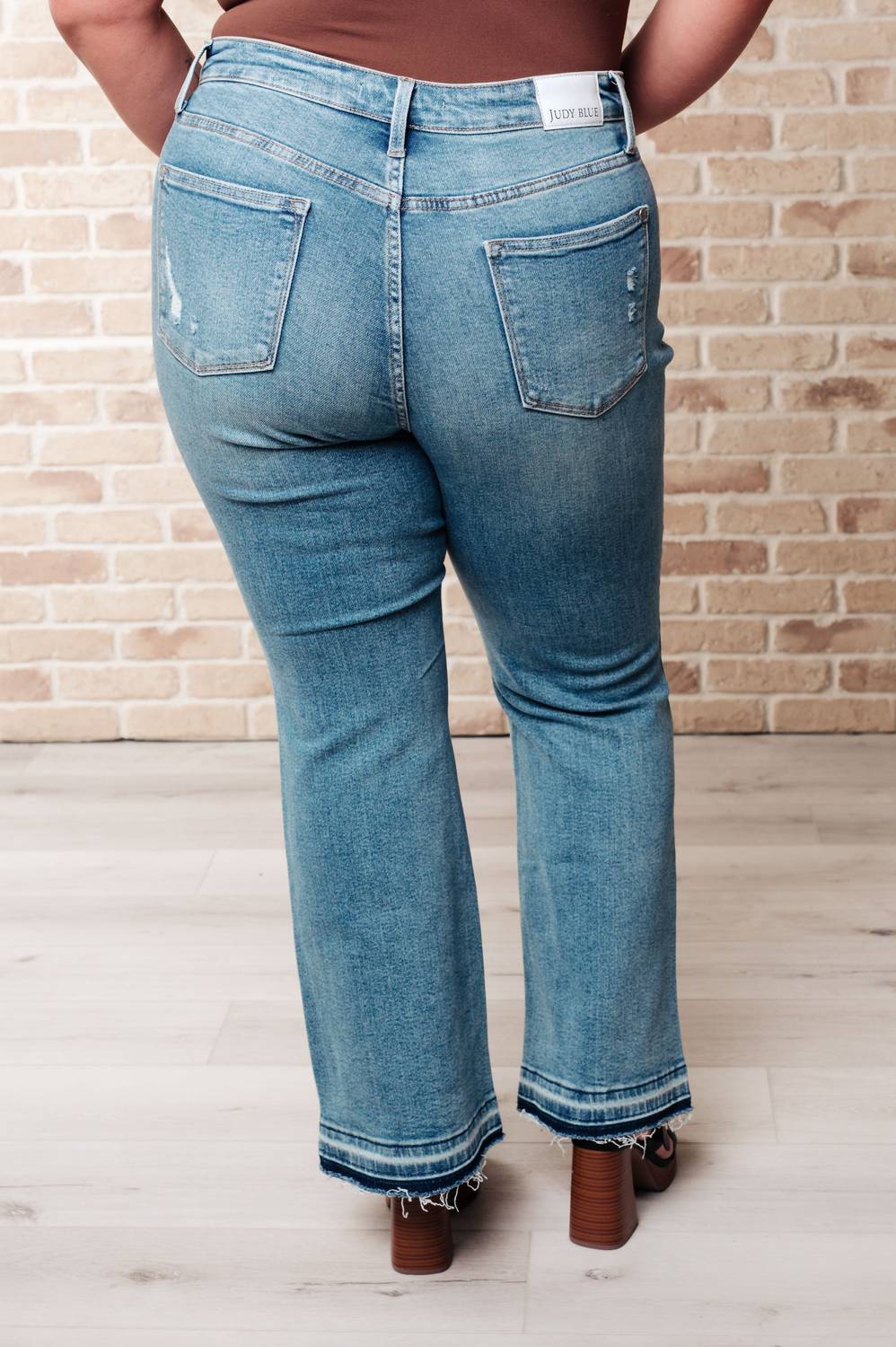 Judy Blue - Isla Mid Rise Distressed Released Hem Bootcut Jeans - blue - boot - cut - clothing