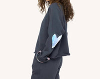 Kerri Rosenthal - Embroidered 'loved' Studio Sweatshirt